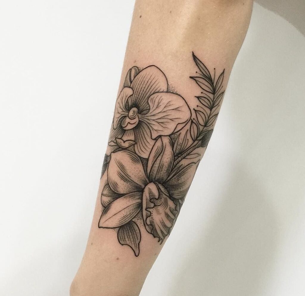 Flower tattoo on the forearm for women