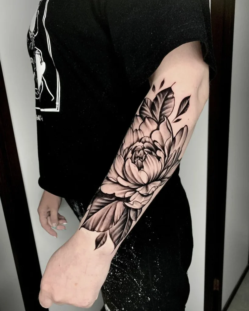 Peony tattoo on the forearm for men