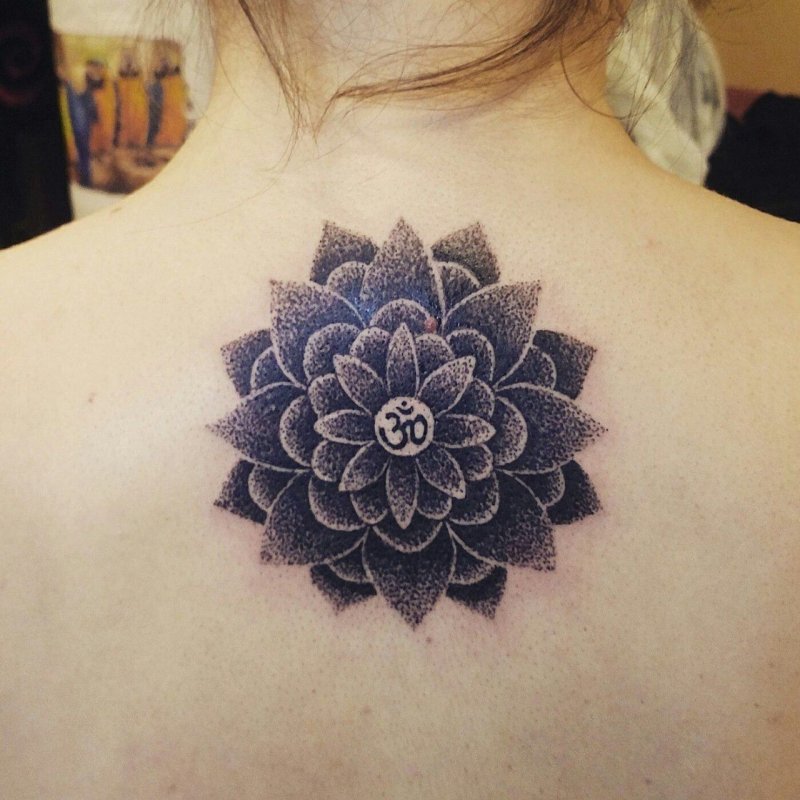 Dotwork tattoo on the back for women