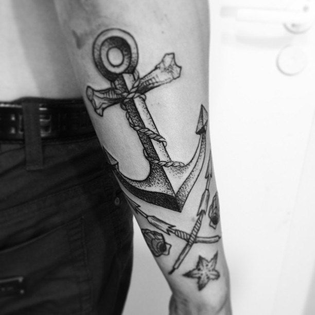 Anchor dotwork tattoo on the forearm for men