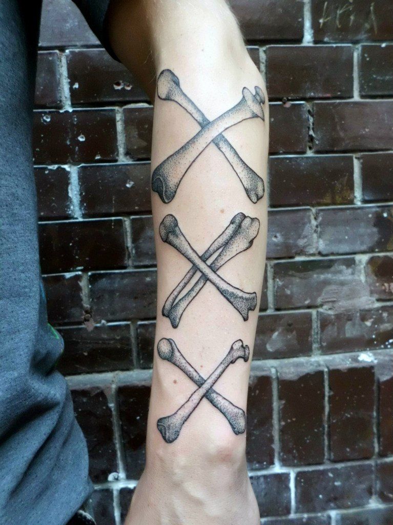 Tattoo in dotwork style on the forearm for men