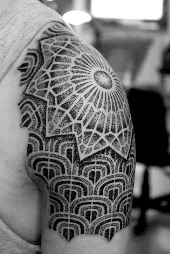 Dotwork tattoo on the shoulder for men