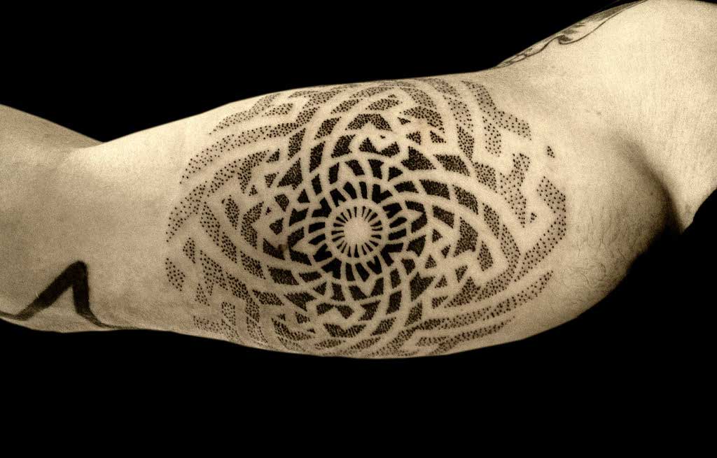 Dotwork tattoo on the arm for men