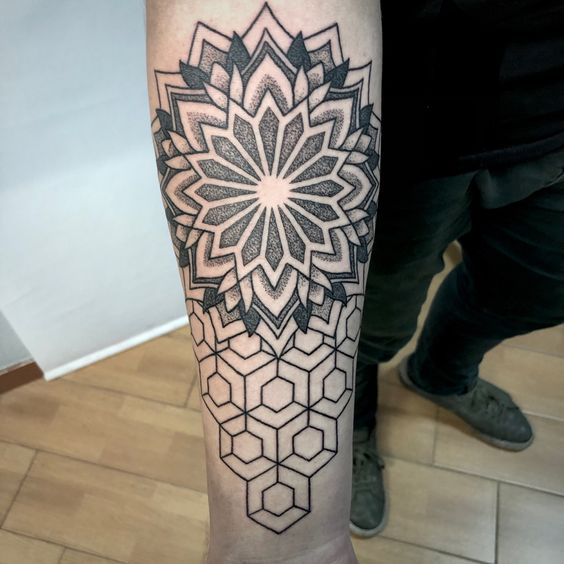 Tattoo in dotwork style on the forearm for men