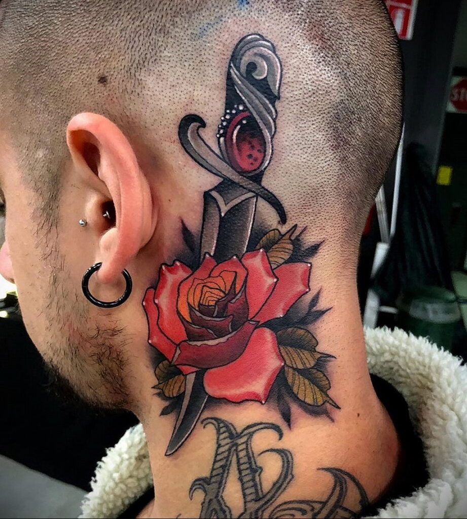 Colorful rose and dagger tattoo on the neck for men