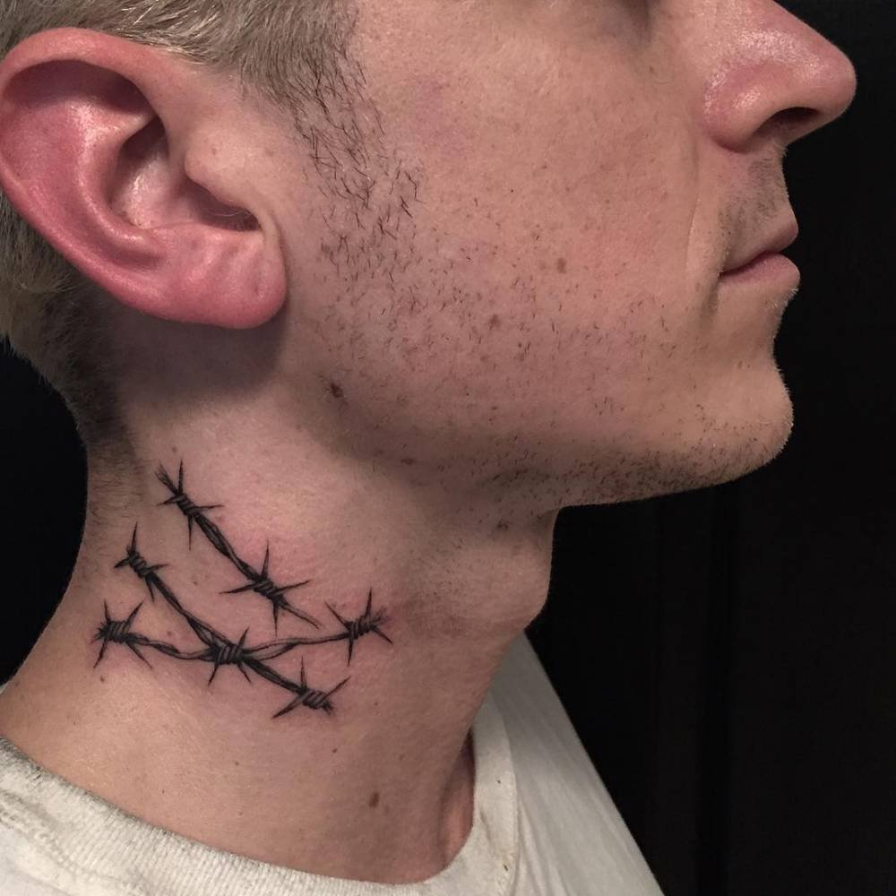 Barbed wire neck tattoo for men