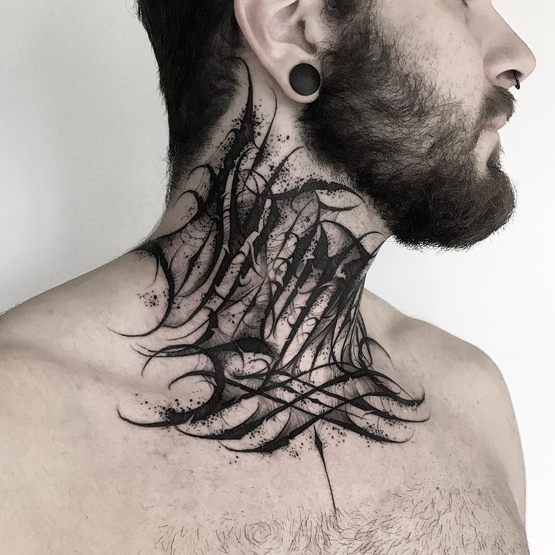 Tattoo with an inscription for men on the neck