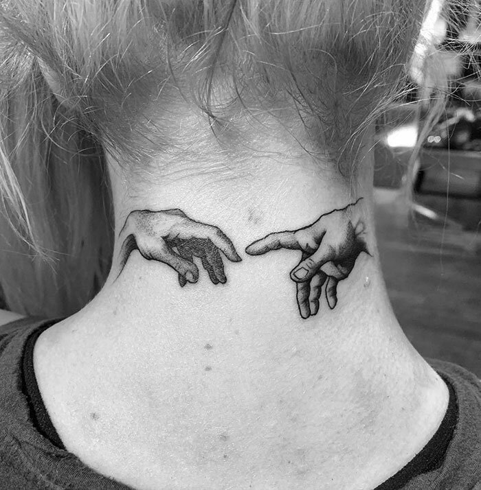 Arm tattoo on the neck for women