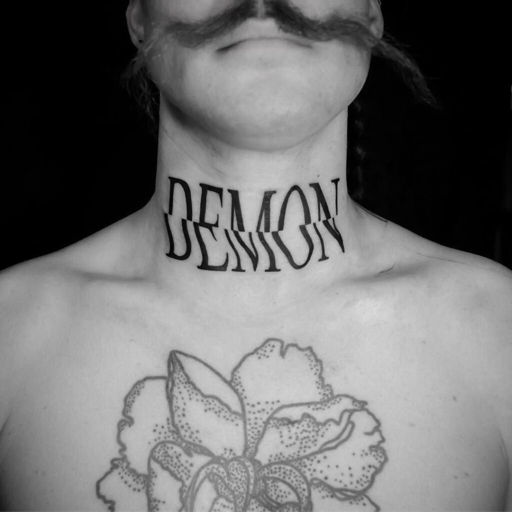 Tattoo with the inscription on the neck for men