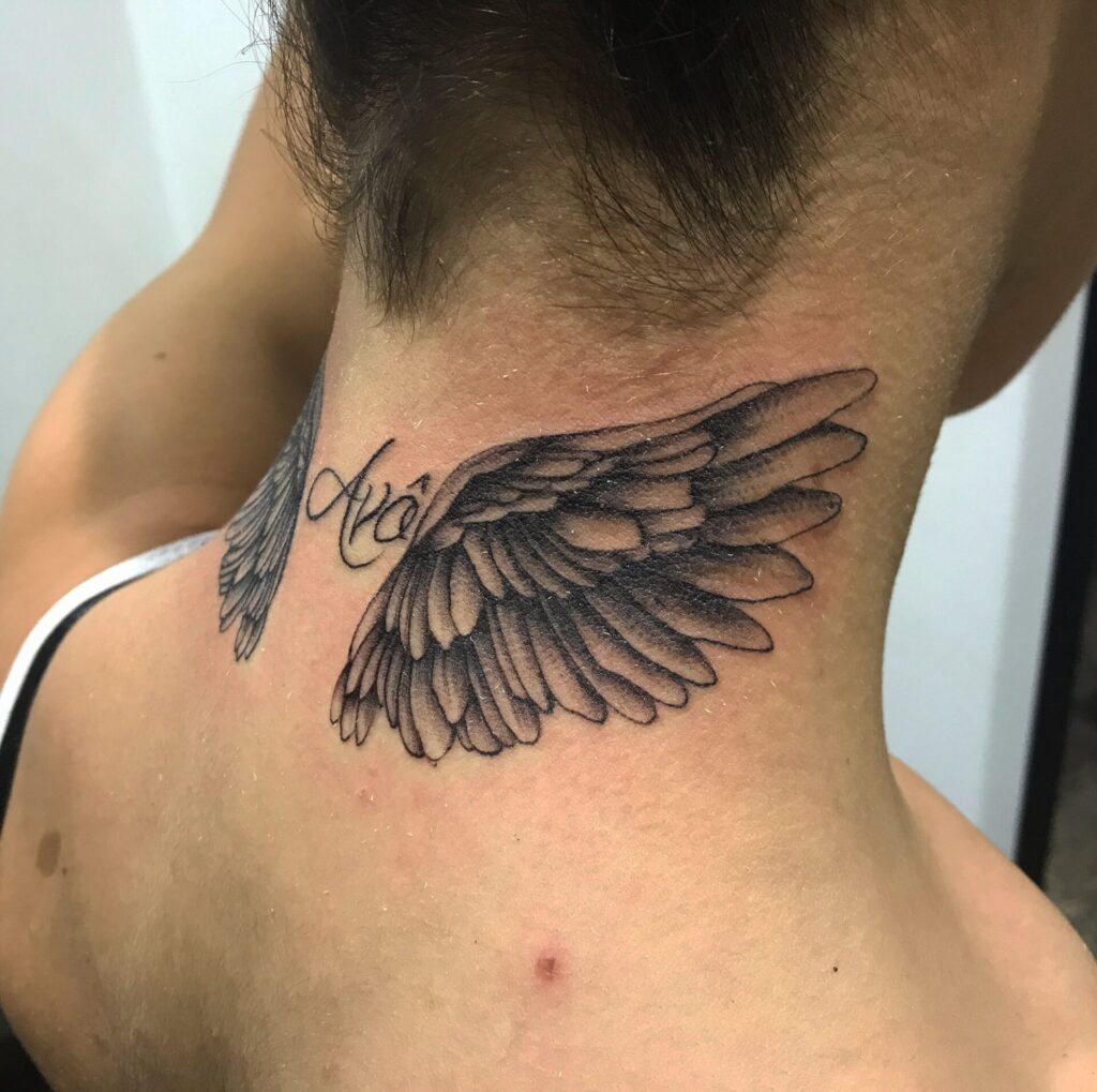 Tattoo of wings on the neck for men