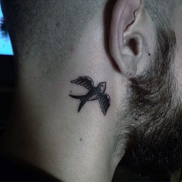 Bird tattoo on the neck for men