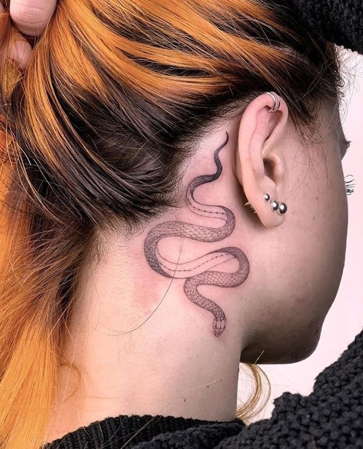 Snake tattoo on the neck for women