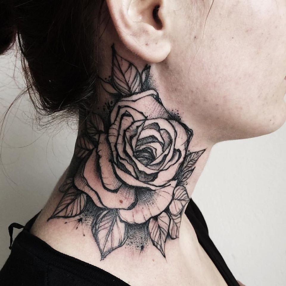 Large rose tattoo on the neck for women