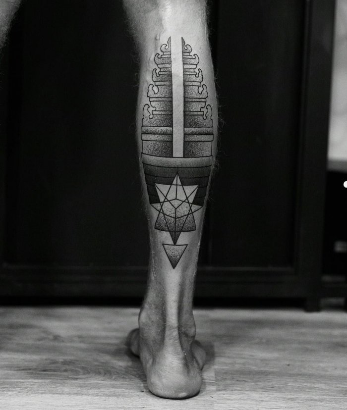 Large tattoo on the calf for men