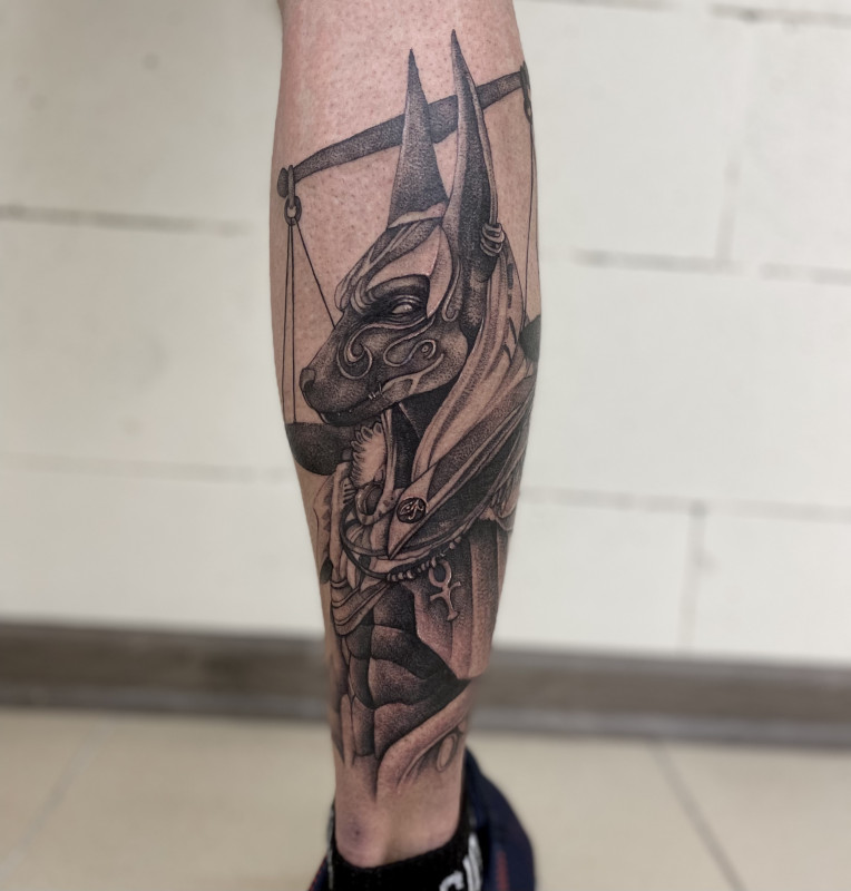 Large tattoo on the calf for men