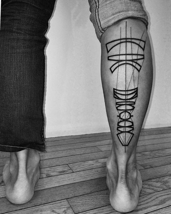 Large tattoo on the calf for men