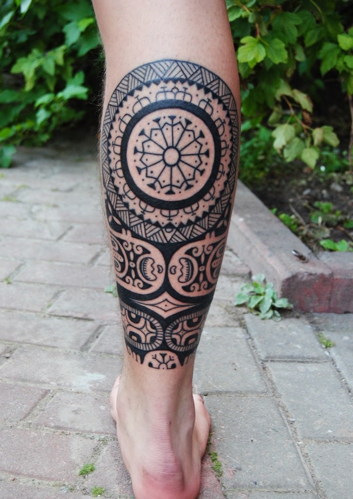 Large tattoo on the calf for men