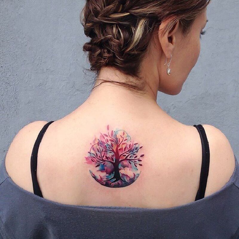 Colorful tree tattoo on the back for women