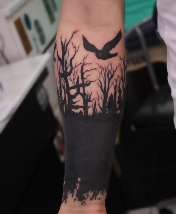 Black&Grey raven and tree tattoo on forearm for men