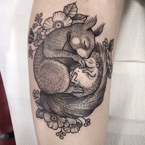 Squirrel and hedgehog tattoo in Black&Grey style on the leg for women