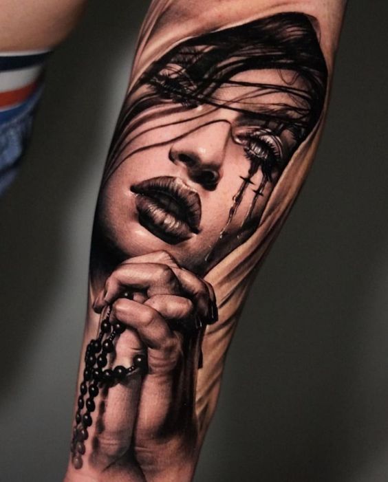 Black&Grey style tattoo on the forearm for women