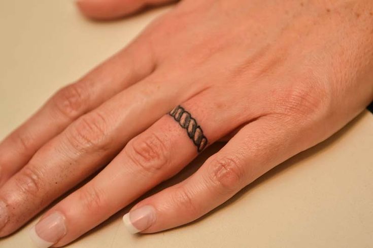 Tattoo rings on the finger for women