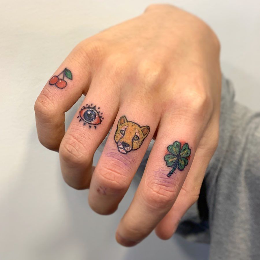 Tattoo on fingers for men