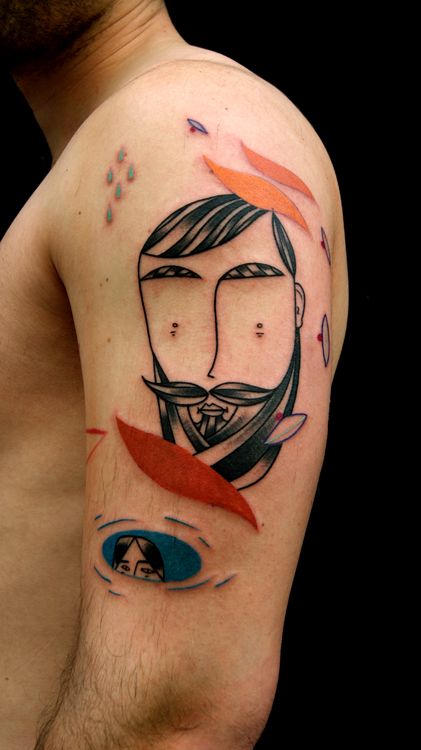 Art brut style tattoo on the shoulder for men