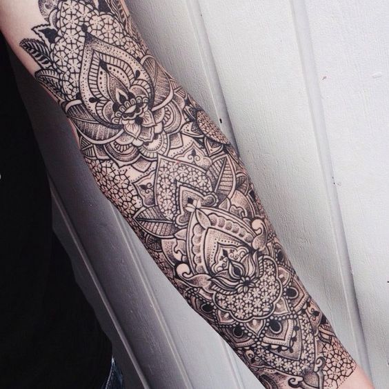 Baroque tattoo on the forearm for women