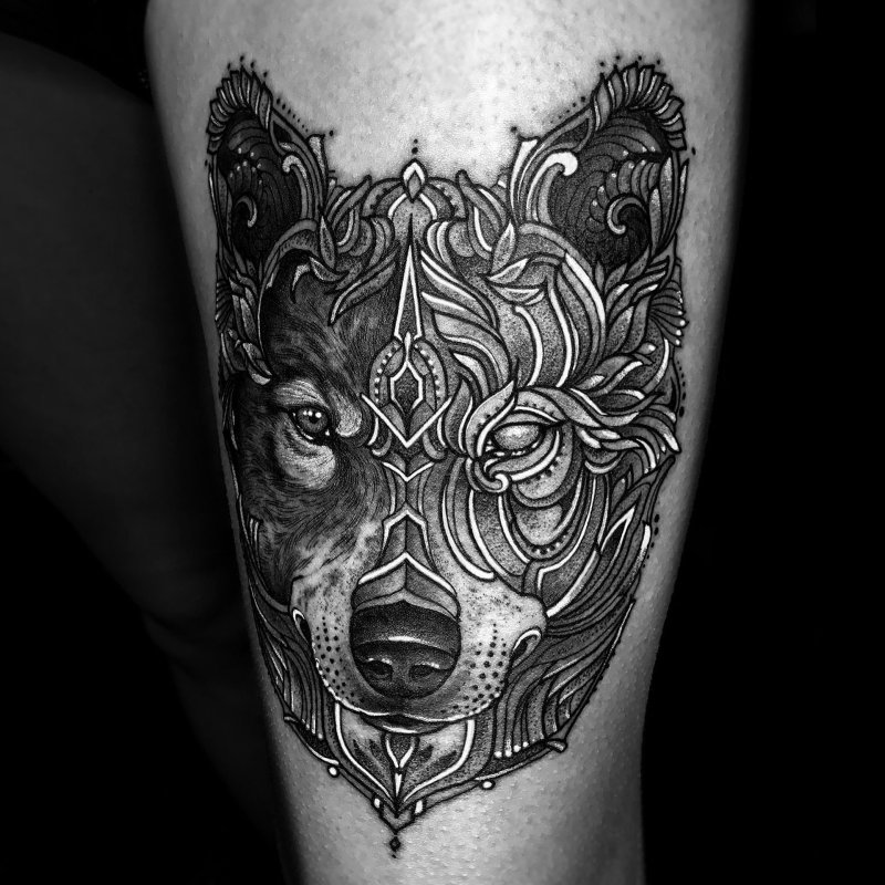 Baroque wolf tattoo on the hip for men