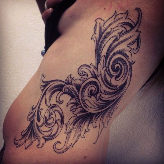 Baroque tattoo on the hip for women