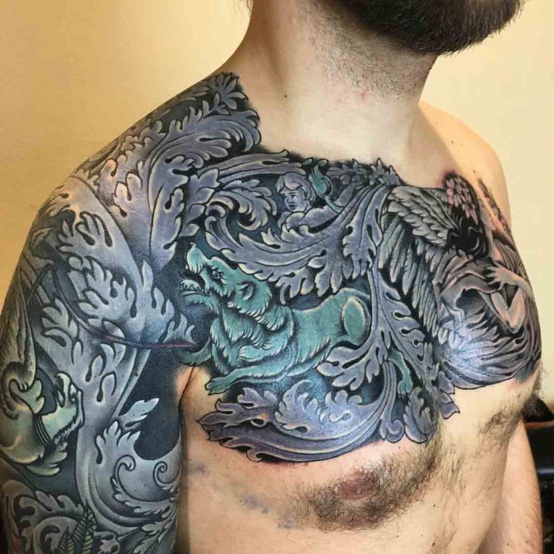 Baroque colored tattoo on the chest for men