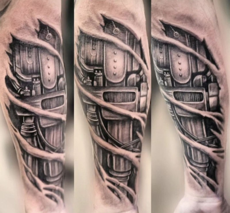 Large biomechanics style tattoo on the forearm for men