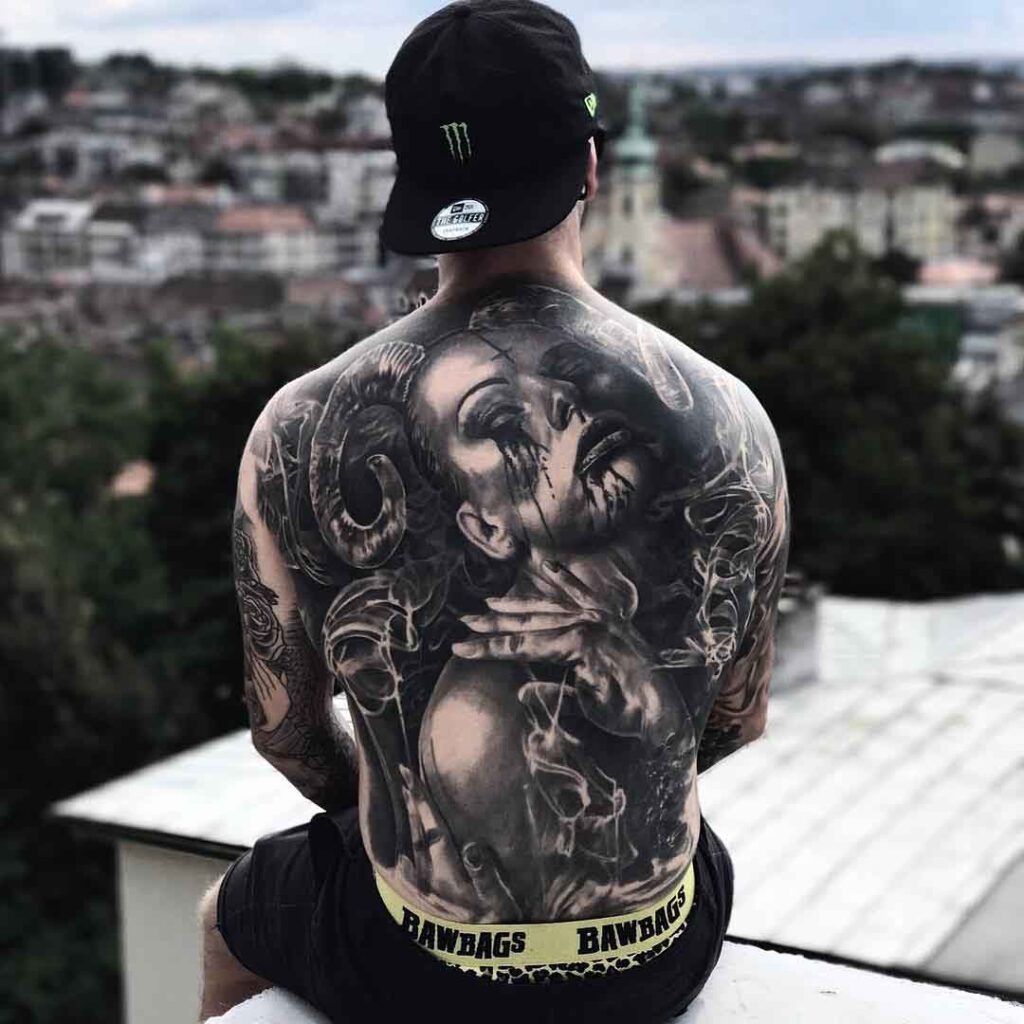 Large Black&Grey style tattoo on the back for men