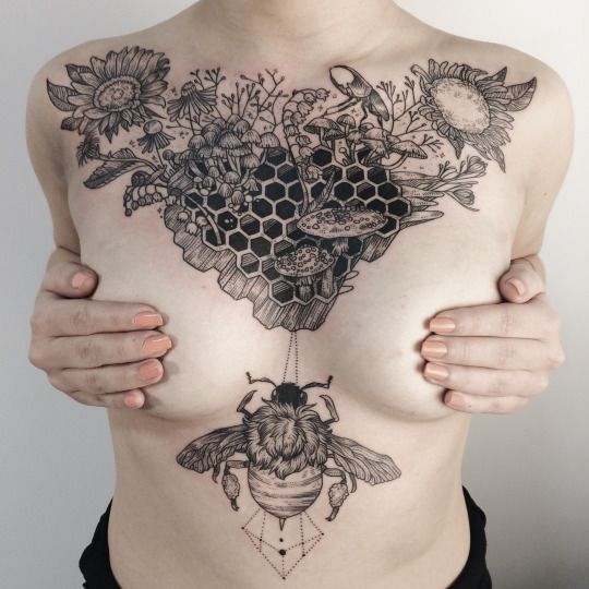 Large chest tattoo for women