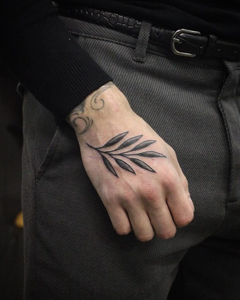 Leaf tattoo on the hand for men