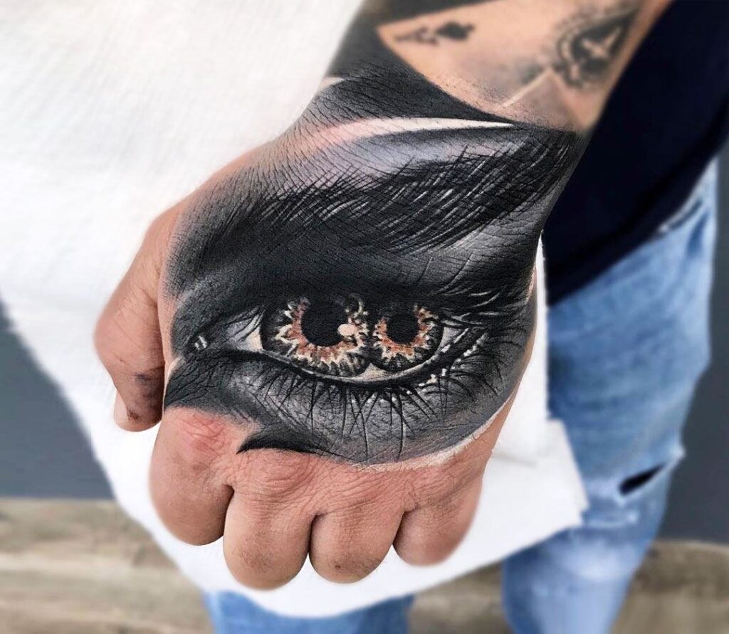 Large eye tattoo on the hand for men