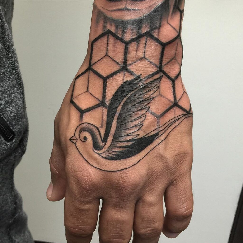 Large bird tattoo on the hand for men