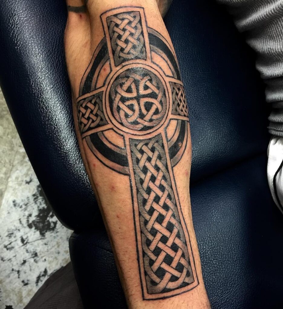 Celtic style tattoo on the forearm for men