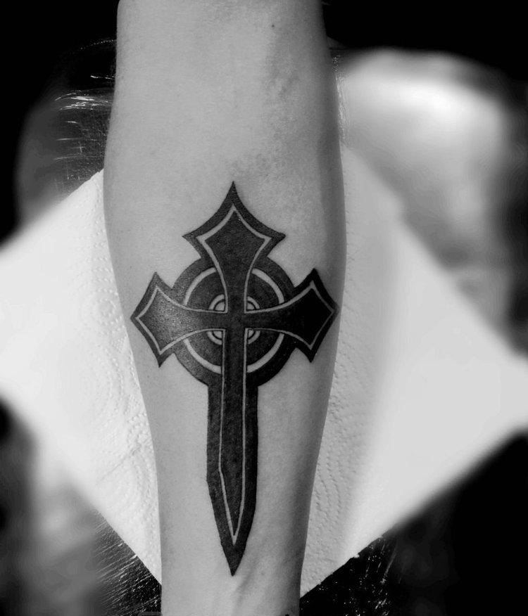 Celtic style tattoo on the forearm for men