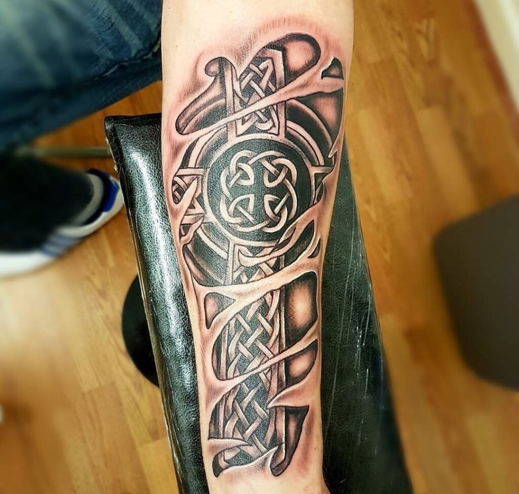 Celtic style tattoo on the forearm for men