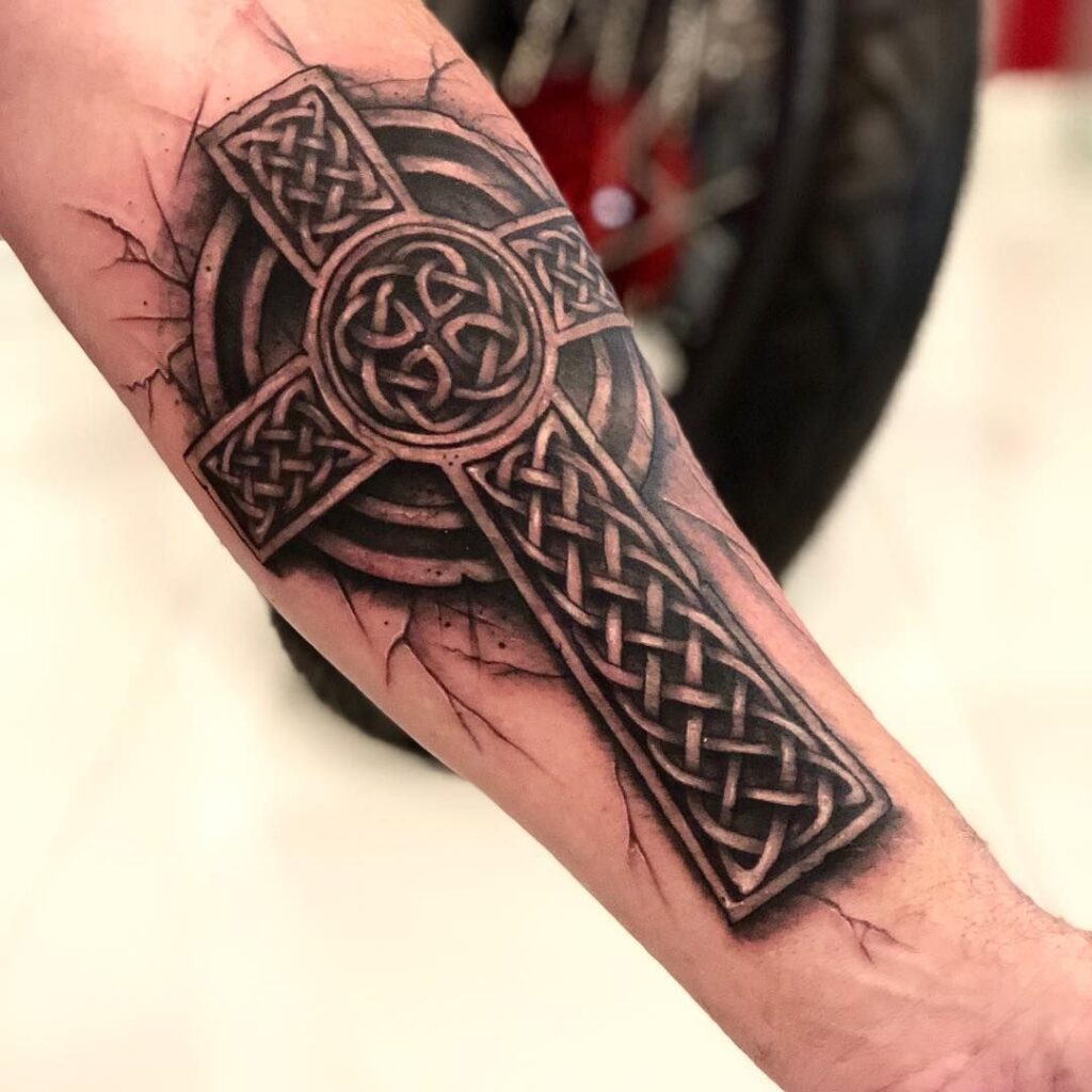 Celtic style tattoo on the forearm for men