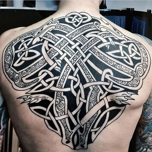 Celtic style tattoo on the back for men