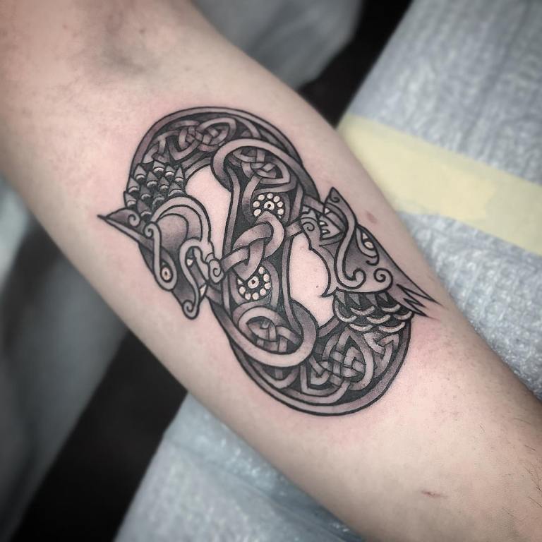 Celtic style tattoo on the forearm for men