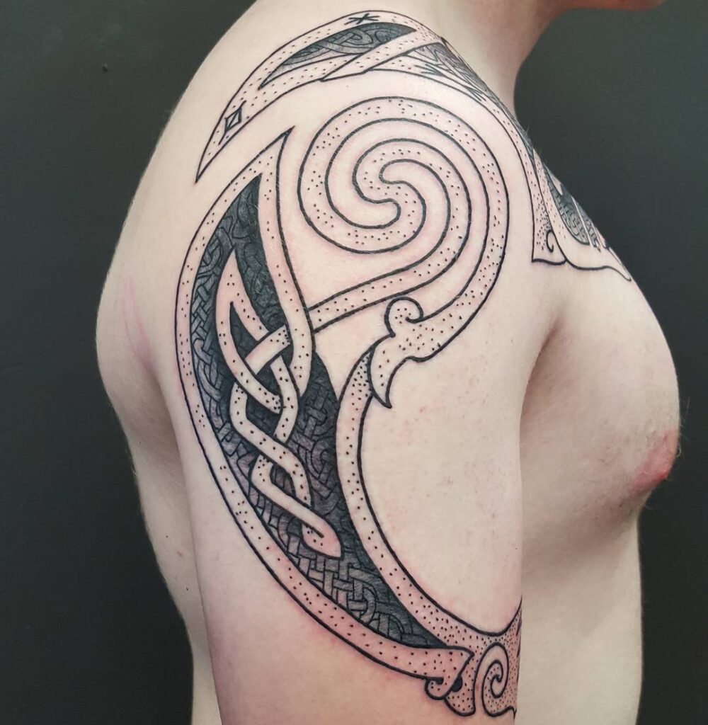 Celtic tattoo on the shoulder for men