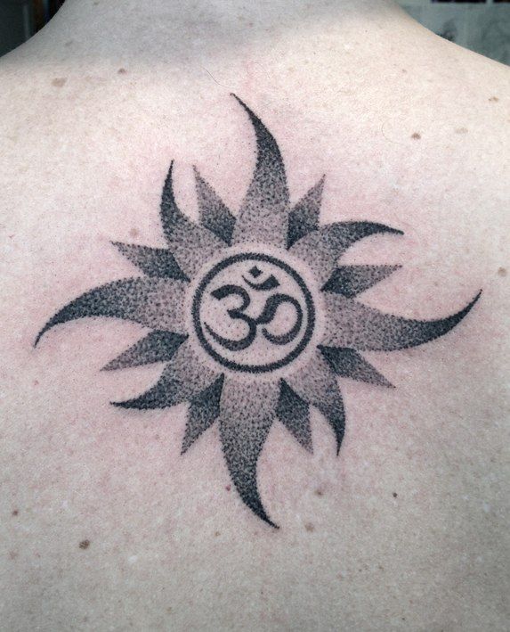 Dotwork sun tattoo on the back for men