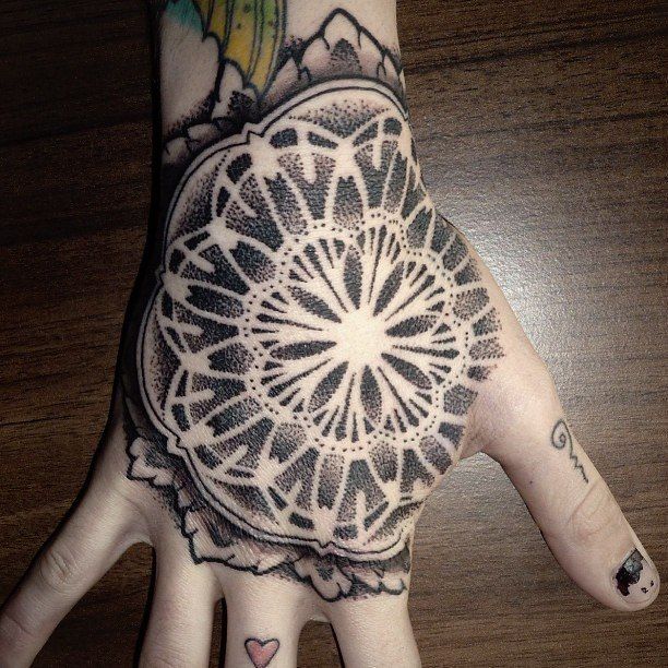 Dotwork style tattoo on the hand for men