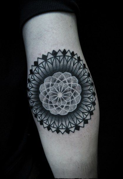 Dotwork tattoo on the shoulder for men