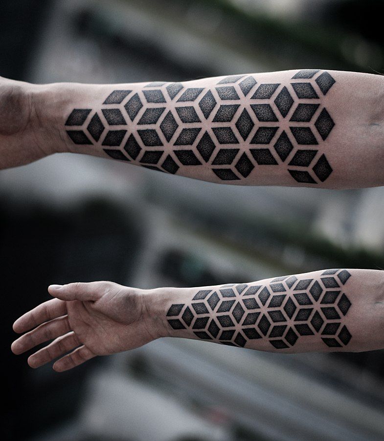 Tattoo in dotwork style on the forearm for men