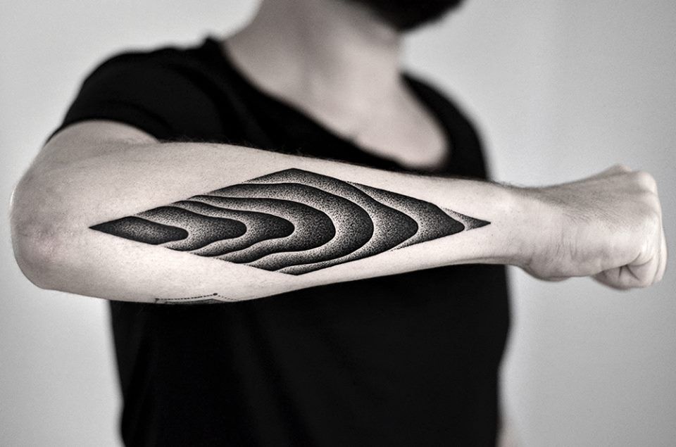 Tattoo in dotwork style on the forearm for men